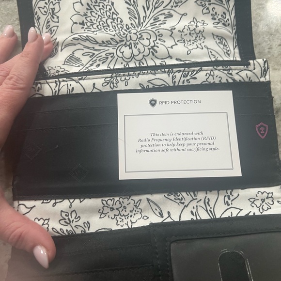 Vera Bradley black quilted wallet.
Barely used.
8”wide x 5” - Picture 3 of 4